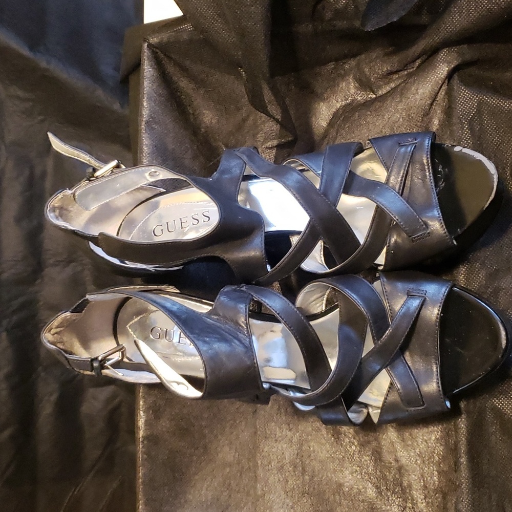 Guess 6 inch open toe strappy heels with a small platform.